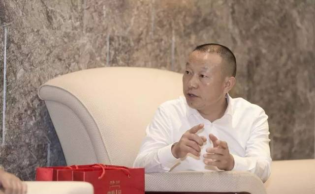 文新茶叶董事长刘文新拜访百货大佬王任生