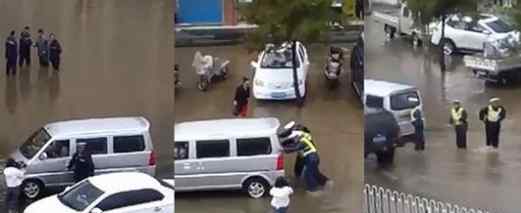 曝交警摆拍雨中推车 扛着摄影机的女记者出卖了一切