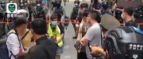 港警连环盘问揪出假记者 涉事女子因涉嫌非法集结被捕