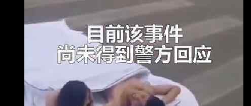 男女裹床单躺斑马线拍婚纱照 完整视频被疯传