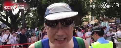 香港市民激动斥责涉港不公报道  质疑“戴着口罩和面具就是法律吗?”