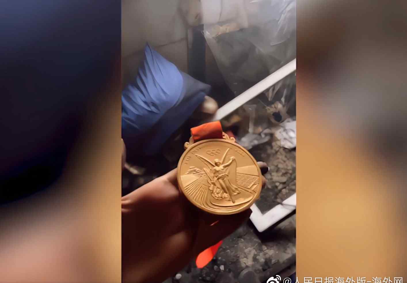 俄奥运冠军家中着火 废墟中北京奥运金牌竟连带子都完好无损！