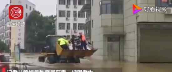 湖北黄梅近500考生坐推土机赶考 最特别的送考车
