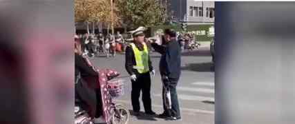 老人闯红灯被阻 愤怒扇交警耳光?具体情况是什么?