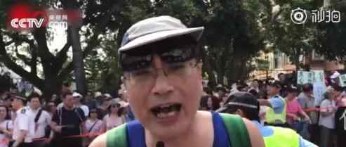 香港市民激动斥责涉港不公报道  质疑“戴着口罩和面具就是法律吗?”