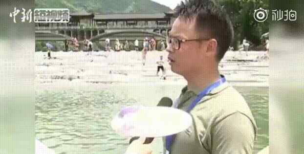 浙江跳水 浙江一男子接受采访时，突然跳水！