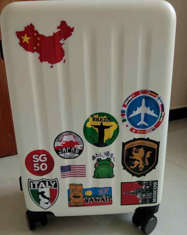 出国行李箱 为什么行李箱上要贴纸有什么用，出国行李箱可以贴贴纸吗
